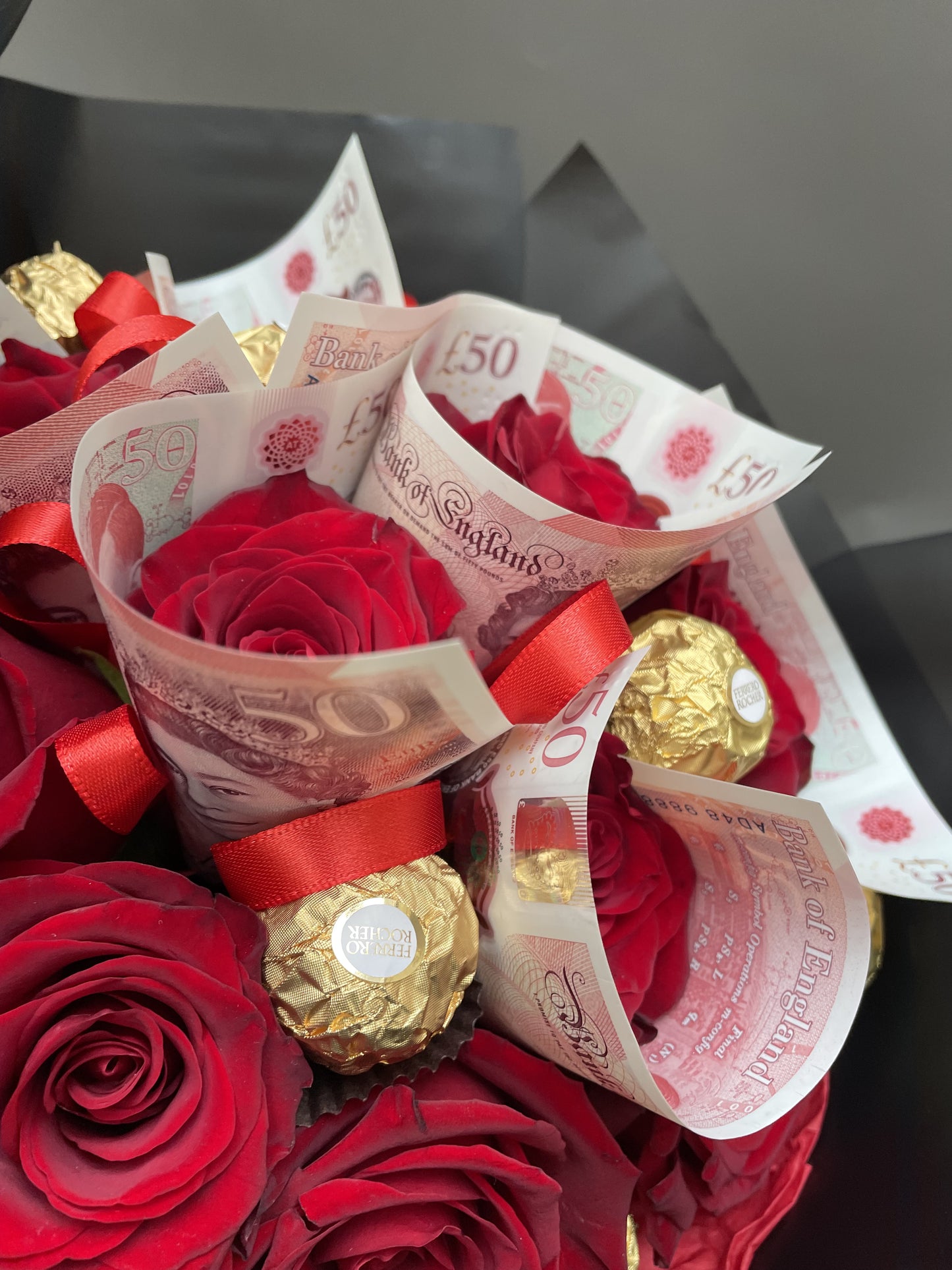 Jordan - bouquet of red roses and chocolates