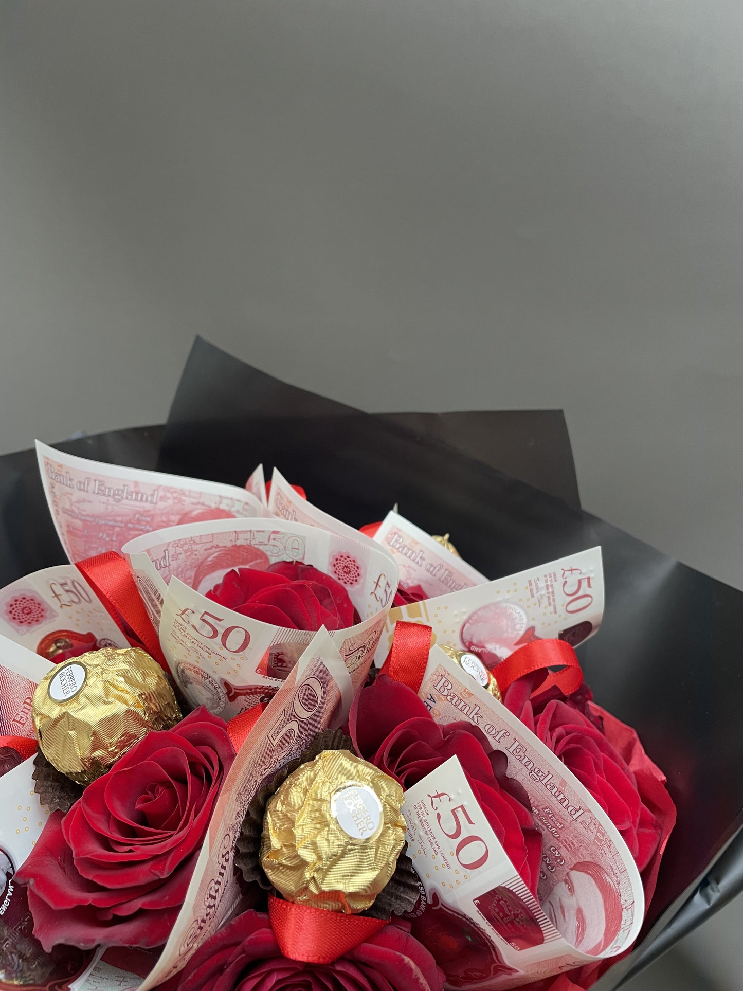 Jordan - bouquet of red roses and chocolates