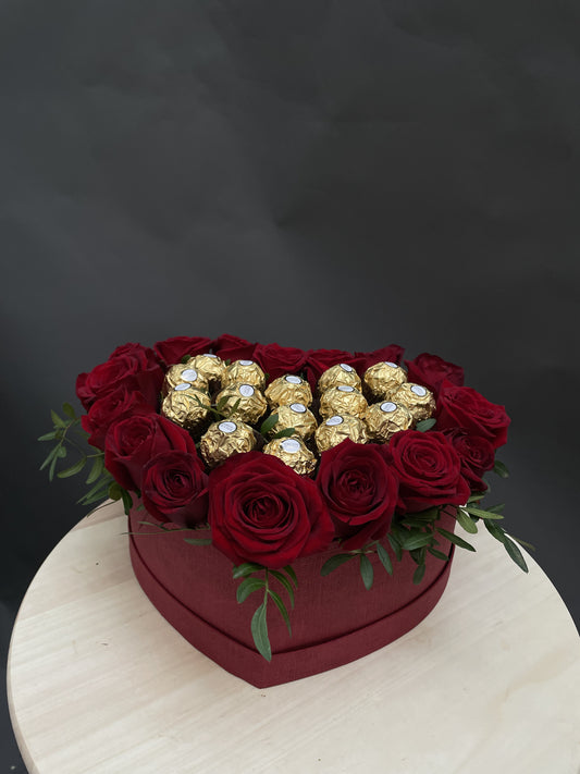 Mandy - a classic gift is red roses and chocolates.