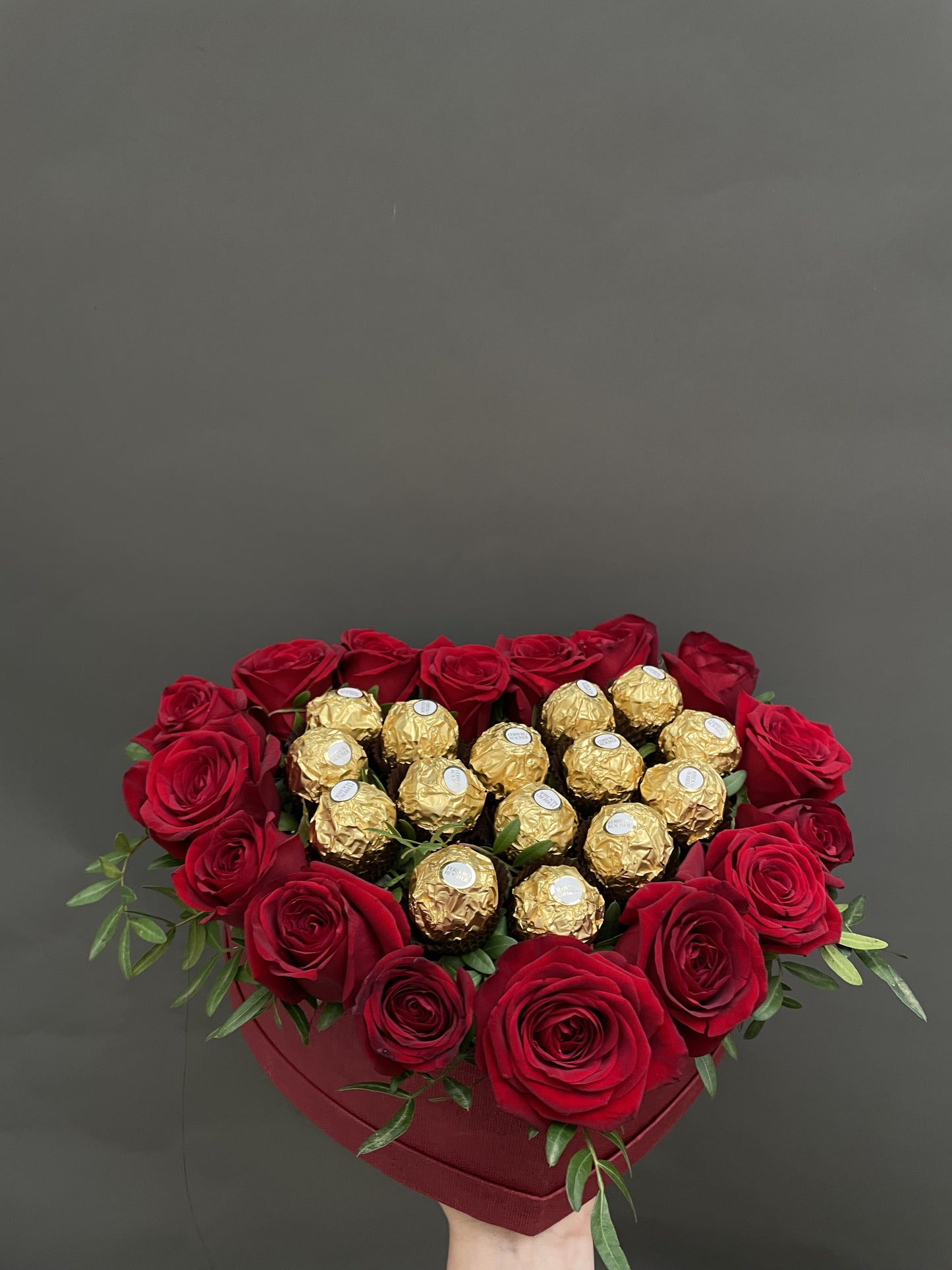 Mandy - a classic gift is red roses and chocolates.