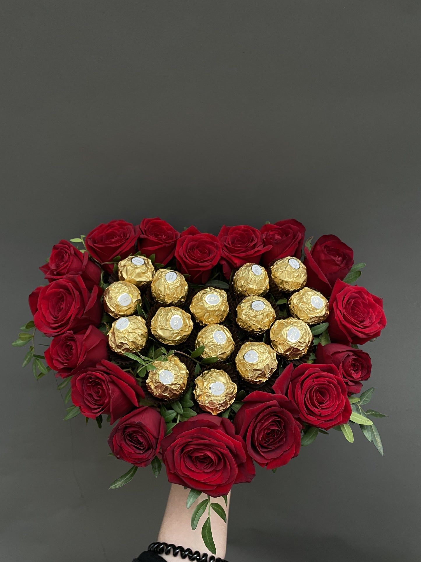 Mandy - a classic gift is red roses and chocolates.